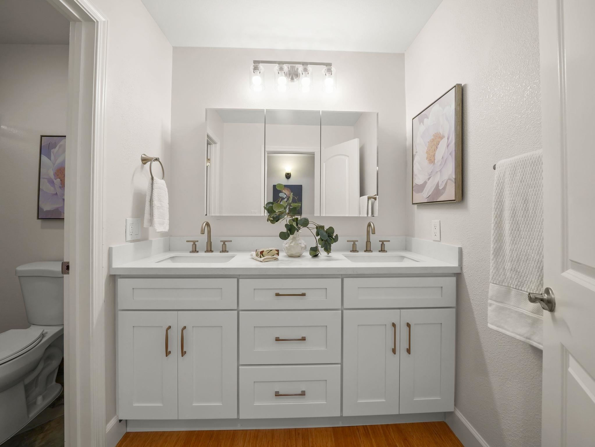 3433 Surry Place Fremont, CA 94536 - Photo 27 of 53 a bathroom with a sink vanity and mirror