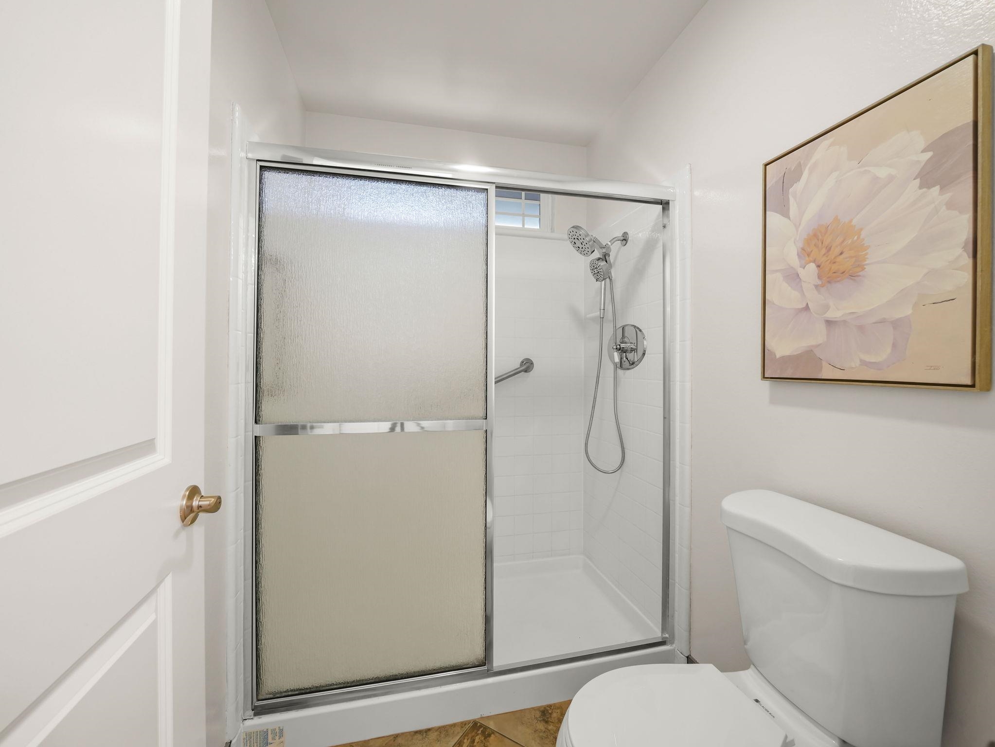 3433 Surry Place Fremont, CA 94536 - Photo 29 of 53 a bathroom with a shower a toilet and a shower
