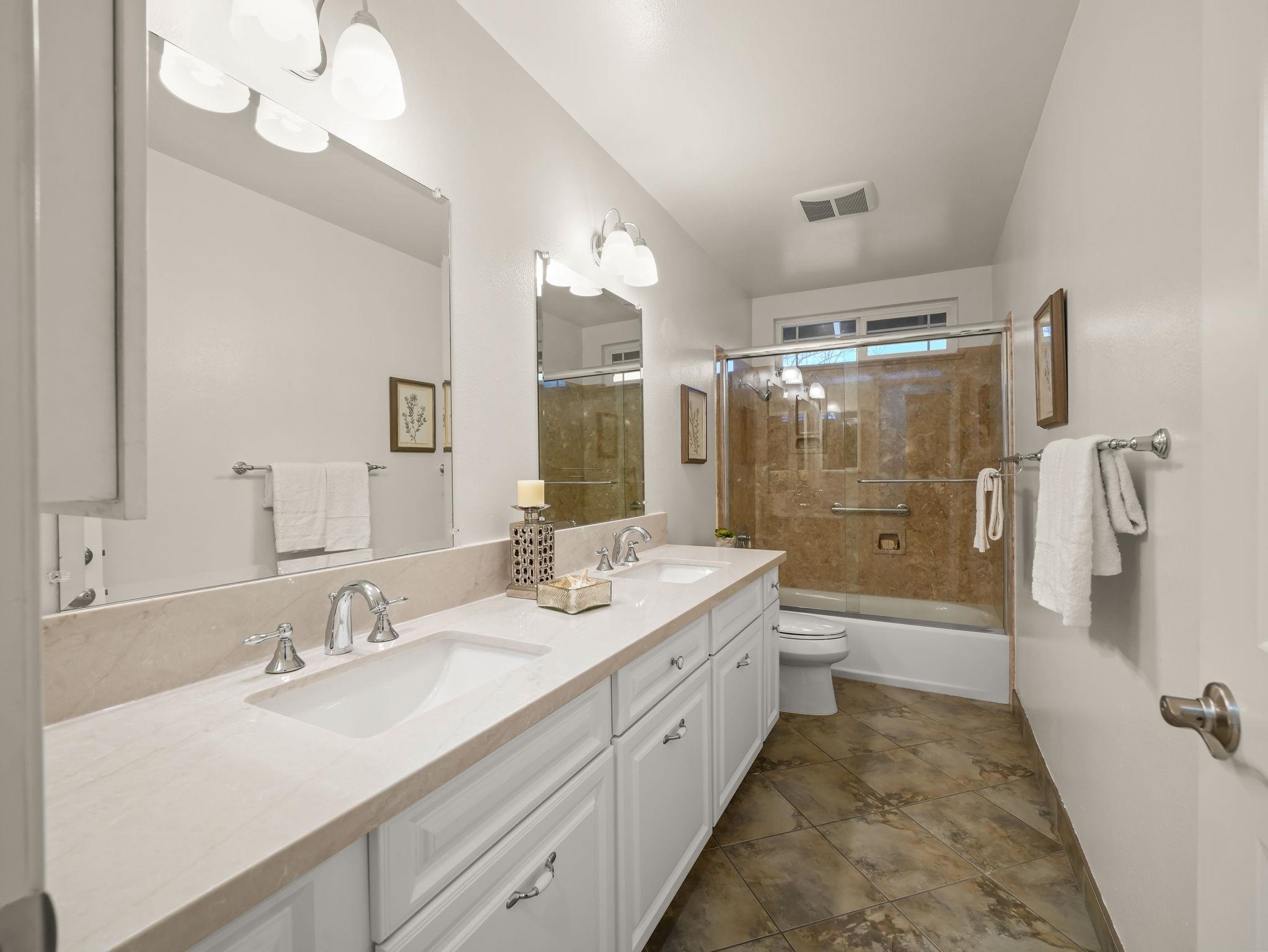 3433 Surry Place Fremont, CA 94536 - Photo 31 of 53 a spacious bathroom with a double vanity sink mirror double and shower