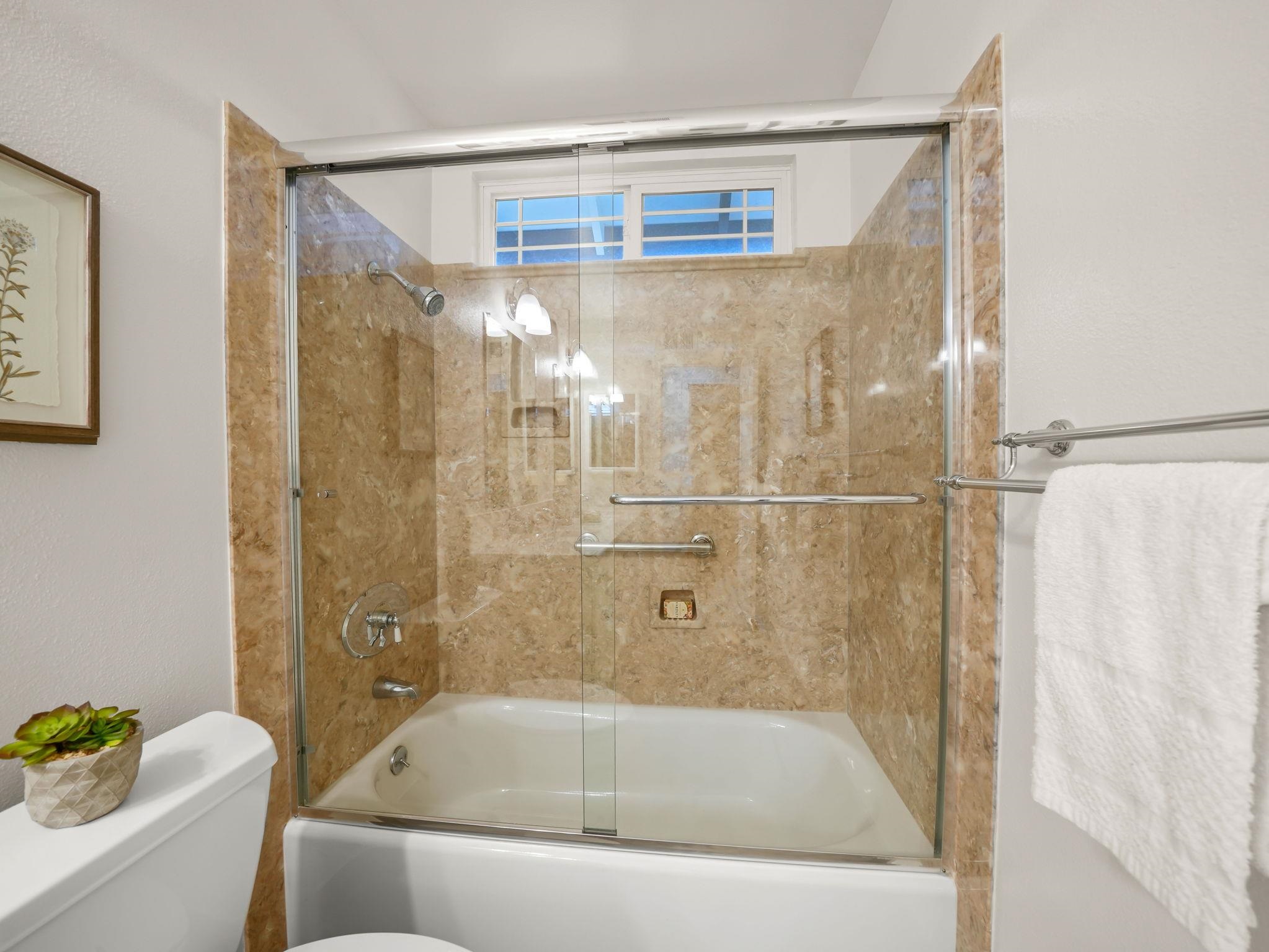 3433 Surry Place Fremont, CA 94536 - Photo 32 of 53 a bathroom with a bathtub and a shower