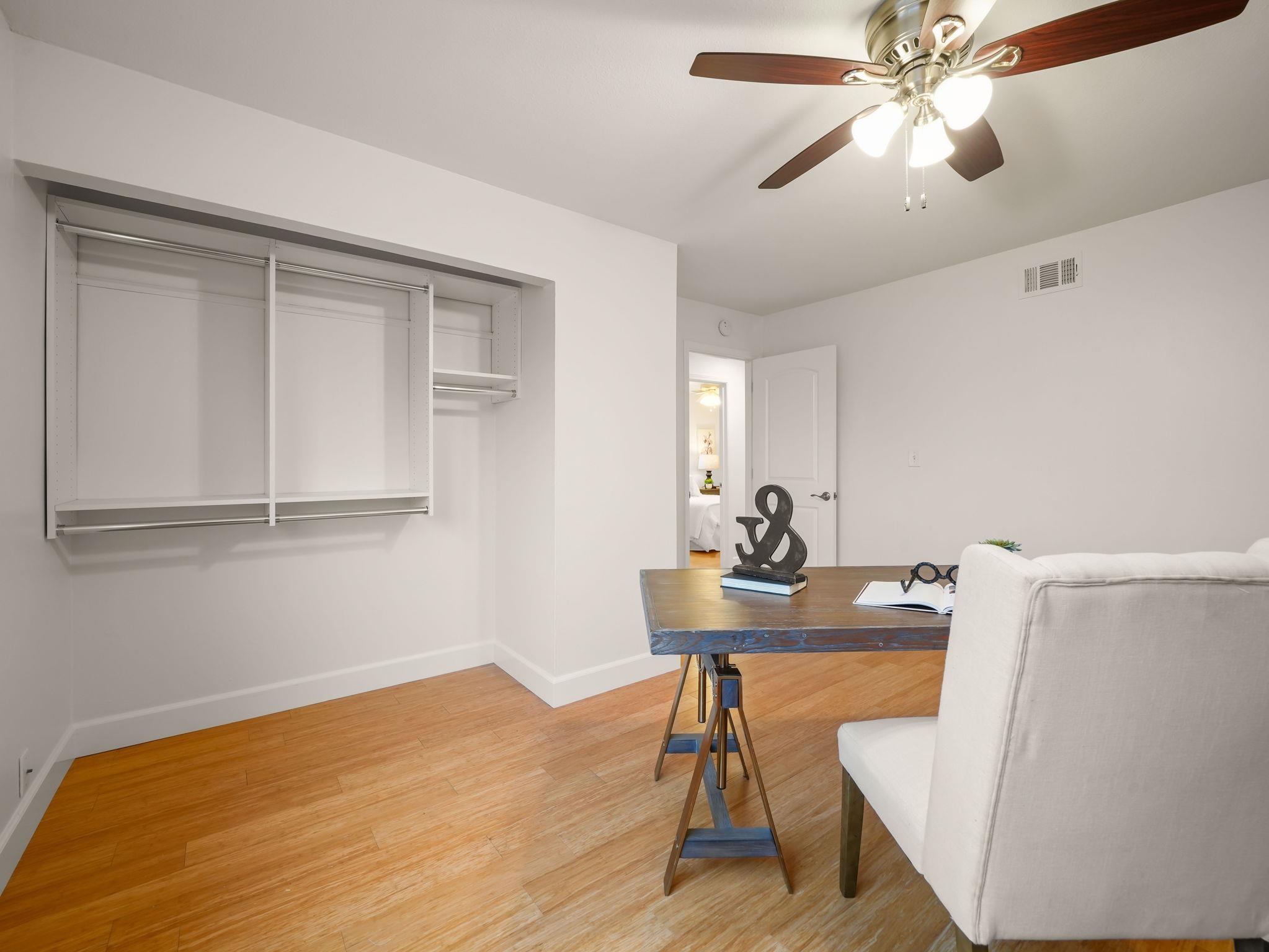 3433 Surry Place Fremont, CA 94536 - Photo 38 of 53 a view of a workspace with furniture and wooden floor