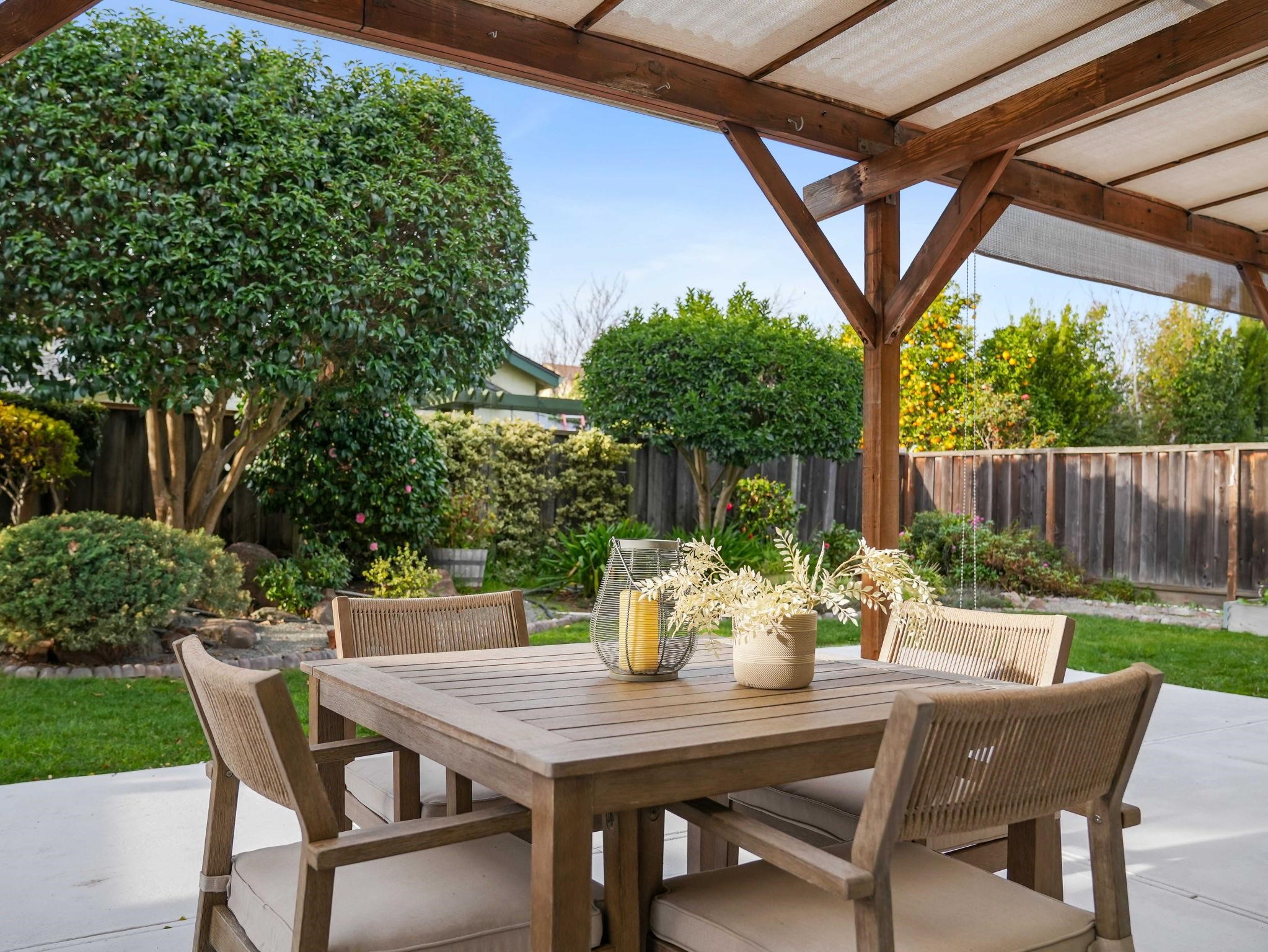 3433 Surry Place Fremont, CA 94536 - Photo 43 of 53 a table and chairs and a table in the patio