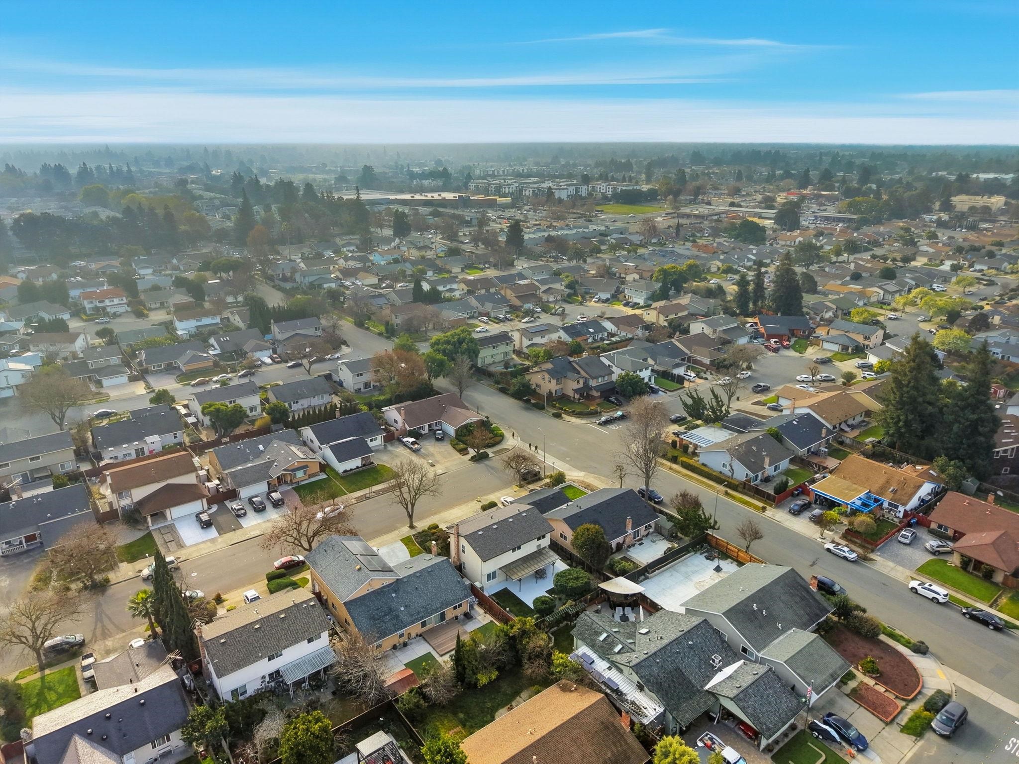 3433 Surry Place Fremont, CA 94536 - Photo 50 of 53 an aerial view of a city with lots of residential buildings