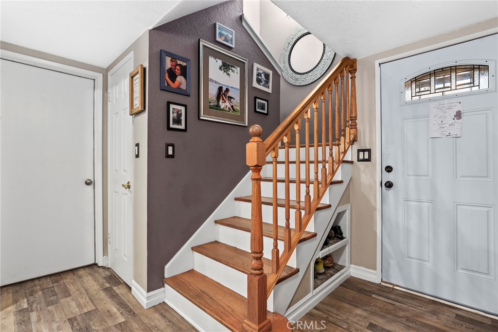 1369 Friant Avenue Simi Valley, CA 93065 - Photo 17 of 38 a view of entryway with stairs and wooden floor