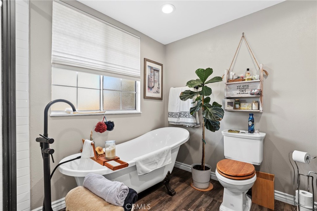 1369 Friant Avenue Simi Valley, CA 93065 - Photo 24 of 38 a living room with furniture and a toilet