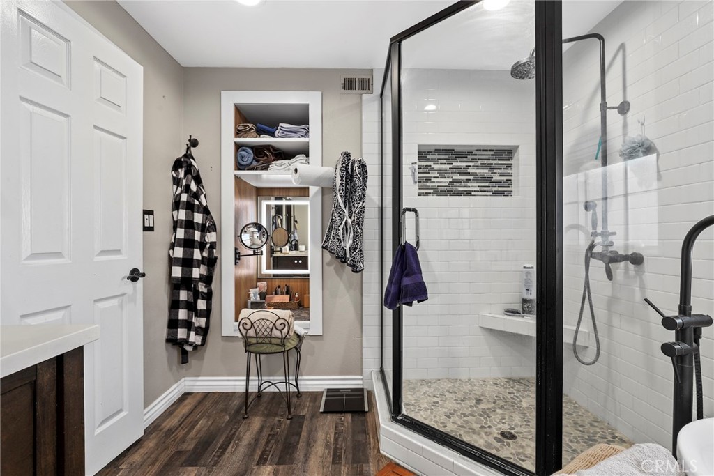 1369 Friant Avenue Simi Valley, CA 93065 - Photo 26 of 38 a view of a hallway with wooden floor and dining room view