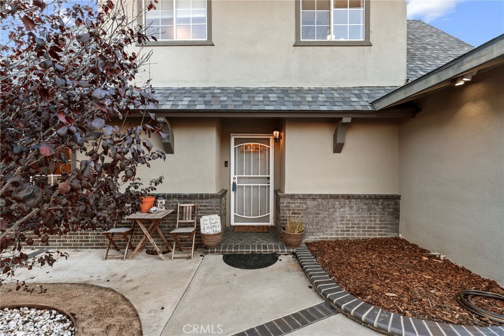 1369 Friant Avenue Simi Valley, CA 93065 - Photo 36 of 38 a table and chairs in front of a window