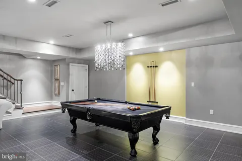 a bedroom with a bed and a view of bathroom