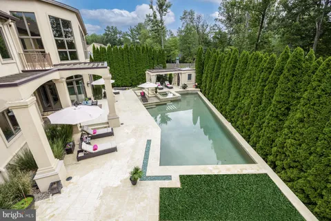 an aerial view of a house with a garden