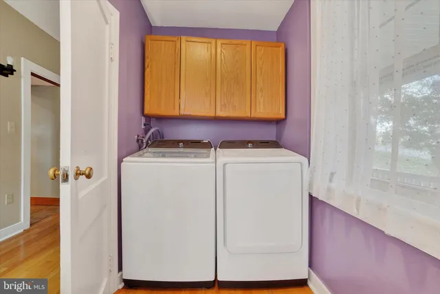 a utility room with dryer and washer