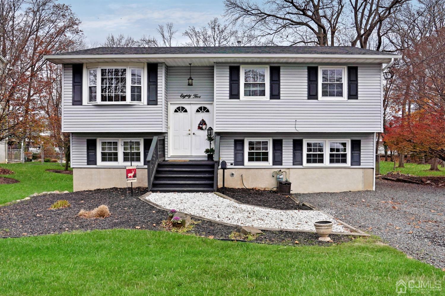 85 Old Post Road Edison, NJ 08817 - Photo 1 of 35 a front view of a house with a yard