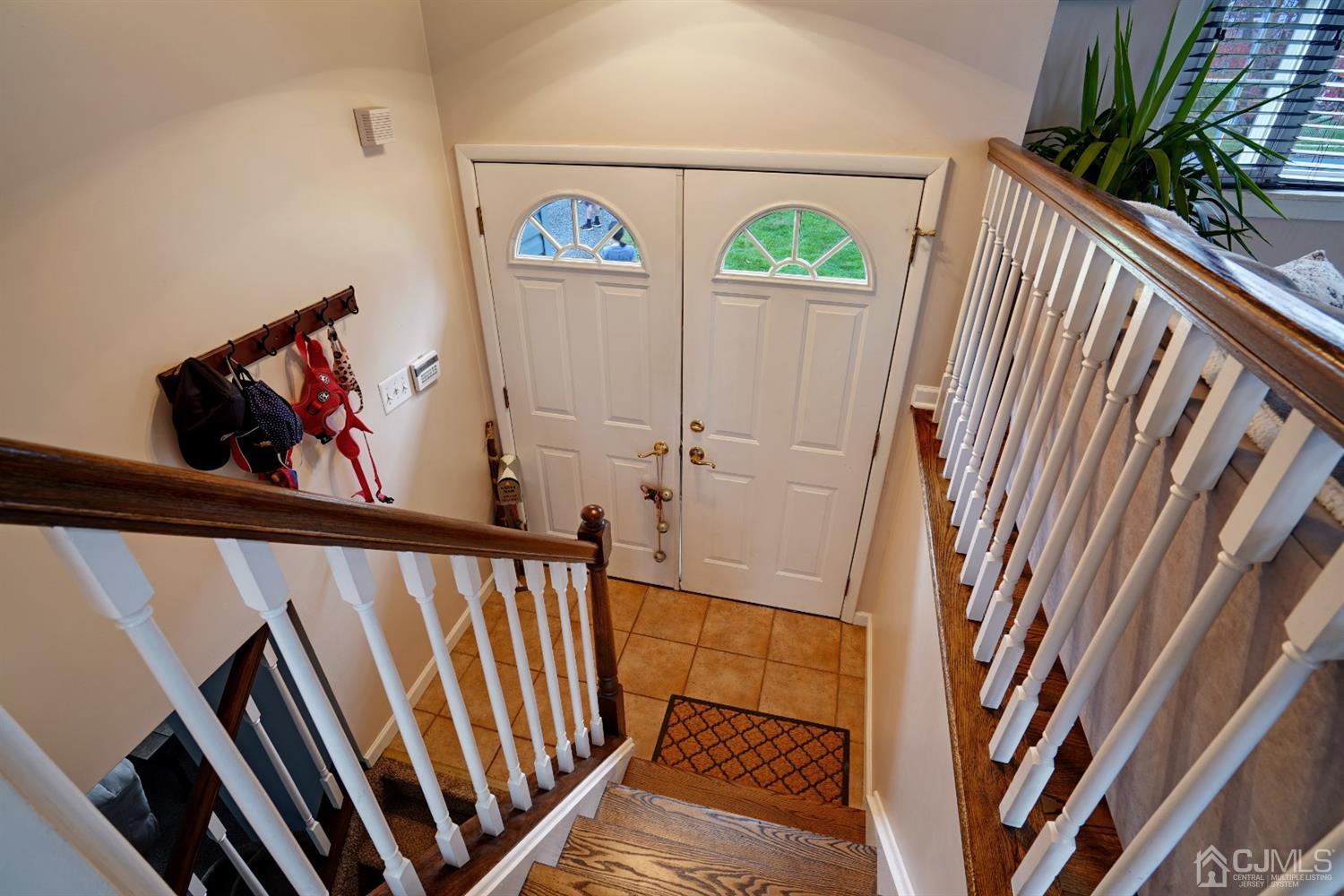 85 Old Post Road Edison, NJ 08817 - Photo 3 of 35 a view of stairs and with wooden floor