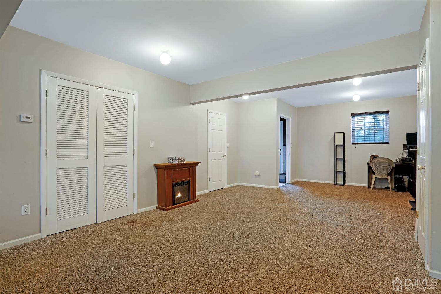 85 Old Post Road Edison, NJ 08817 - Photo 23 of 35 a view of an empty room with furniture and a window