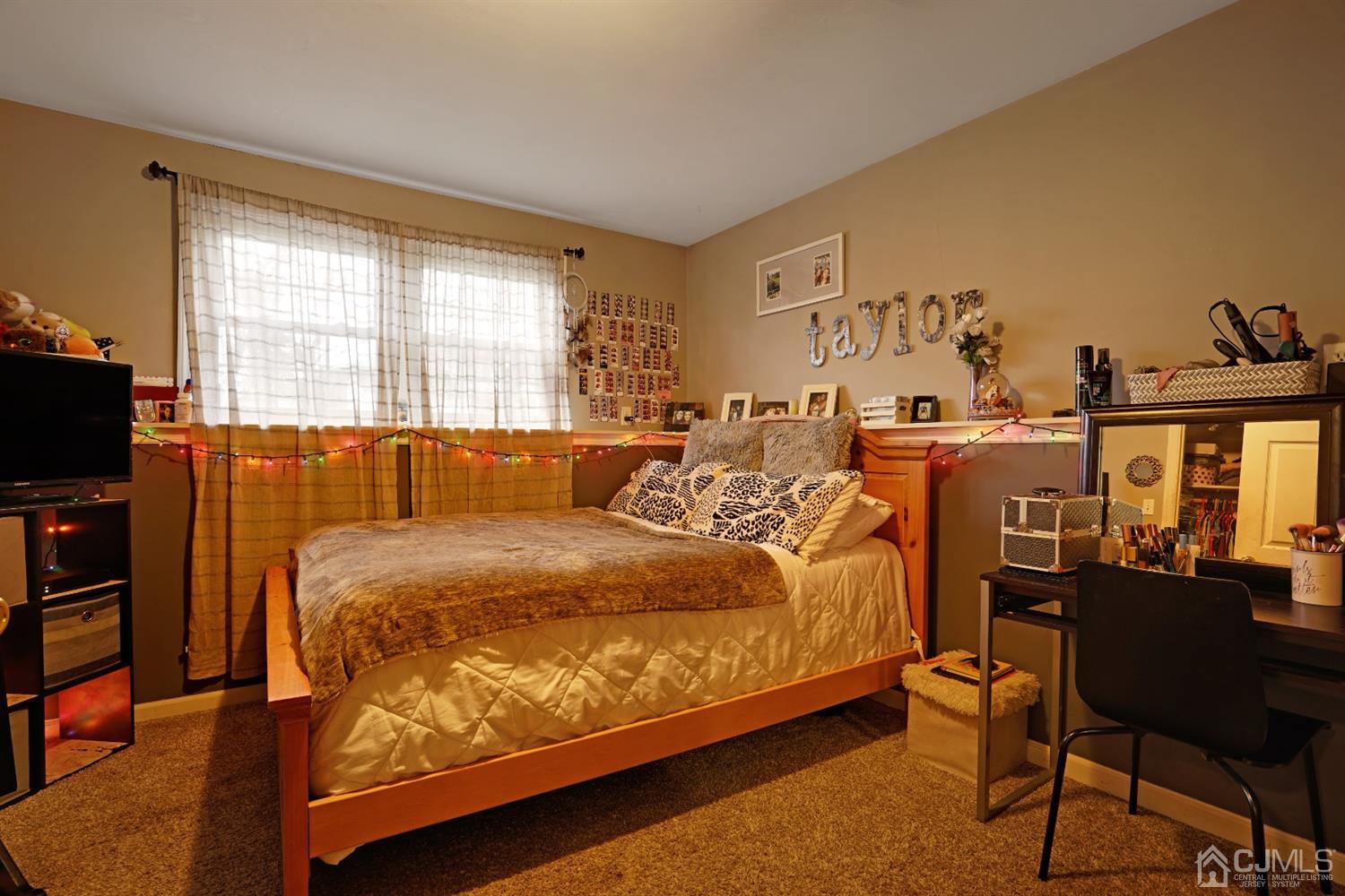 85 Old Post Road Edison, NJ 08817 - Photo 24 of 35 a bed room with a bed and a chair