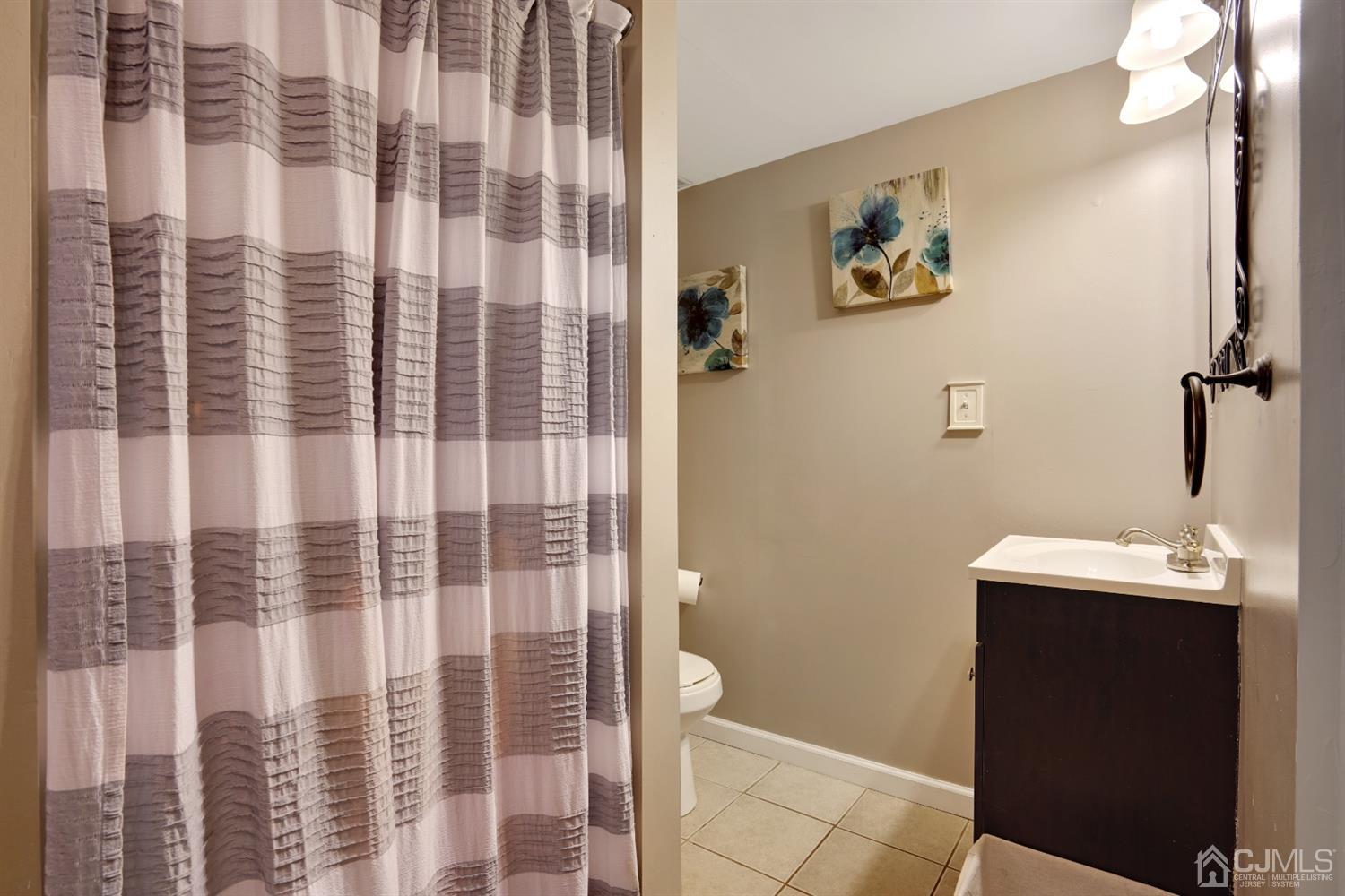 85 Old Post Road Edison, NJ 08817 - Photo 26 of 35 a bathroom with a sink and a mirror