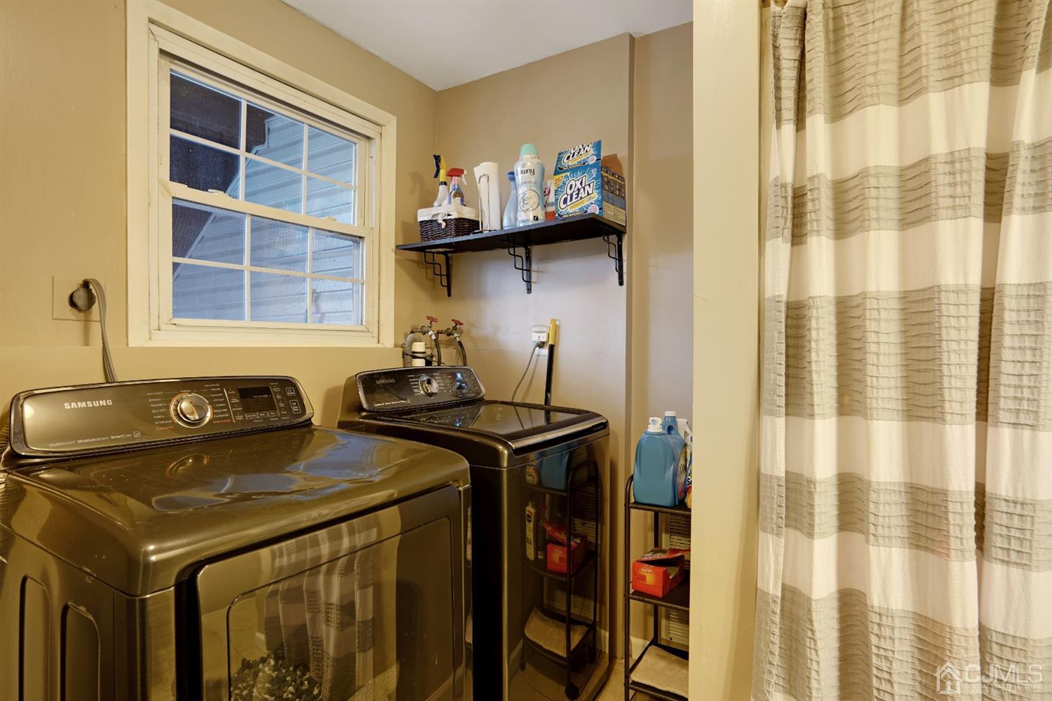85 Old Post Road Edison, NJ 08817 - Photo 27 of 35 a utility room with dryer and washer