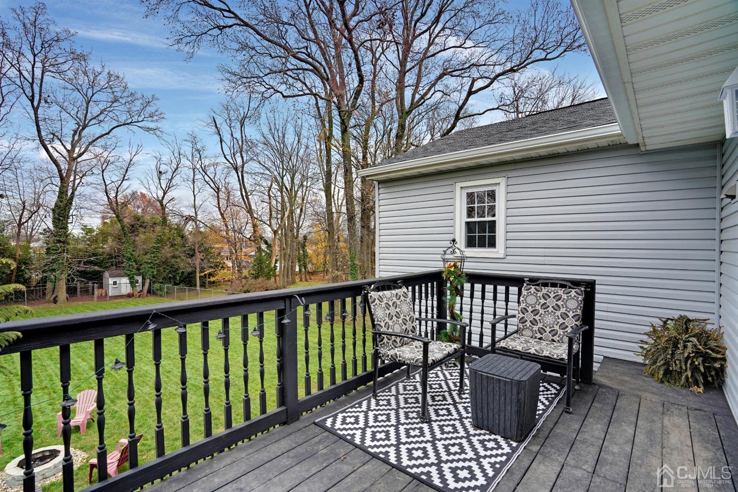 85 Old Post Road Edison, NJ 08817 - Photo 28 of 35 a view of balcony with furniture and wooden floor