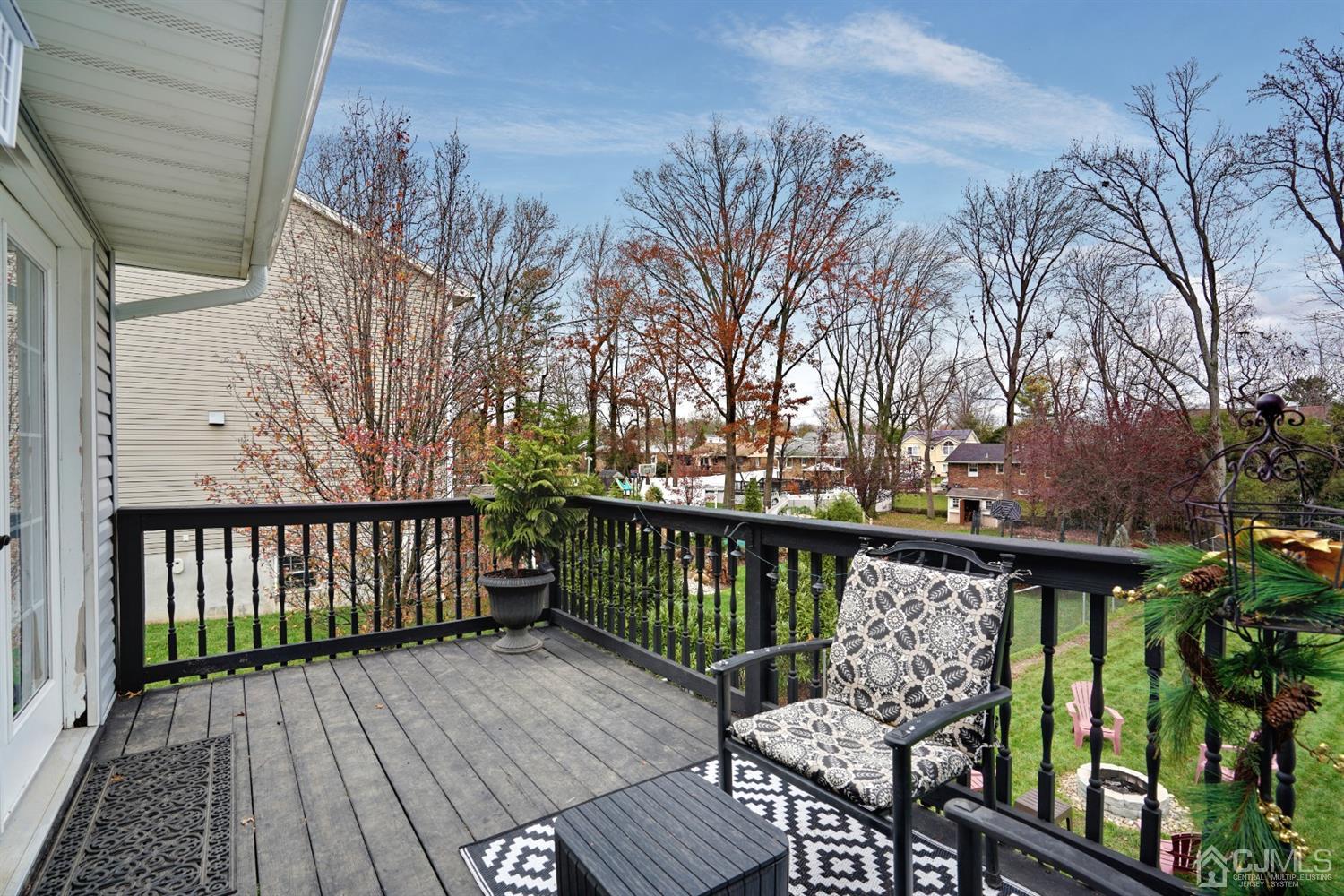 85 Old Post Road Edison, NJ 08817 - Photo 29 of 35 a view of deck with wooden floor and seating space