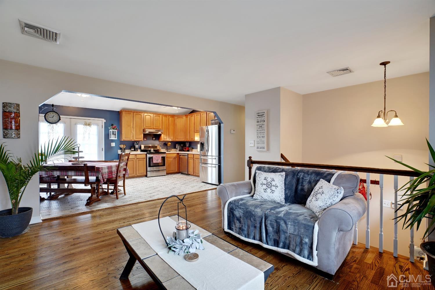 85 Old Post Road Edison, NJ 08817 - Photo 6 of 35 a living room with furniture and wooden floor