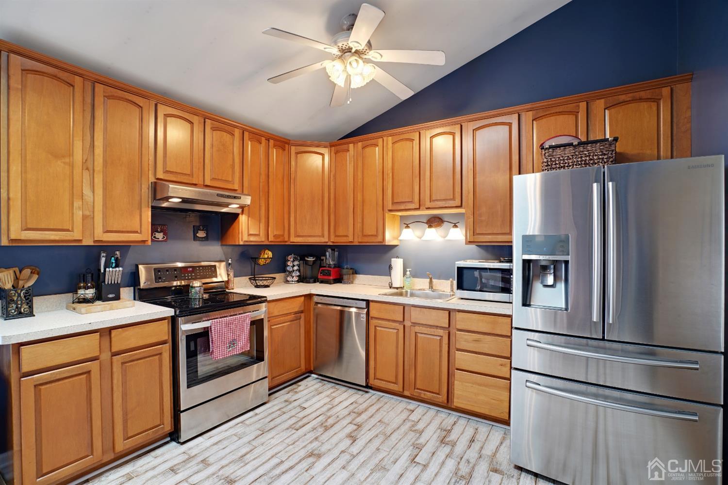 85 Old Post Road Edison, NJ 08817 - Photo 8 of 35 a kitchen with stainless steel appliances granite countertop a refrigerator a sink dishwasher stove and cabinets