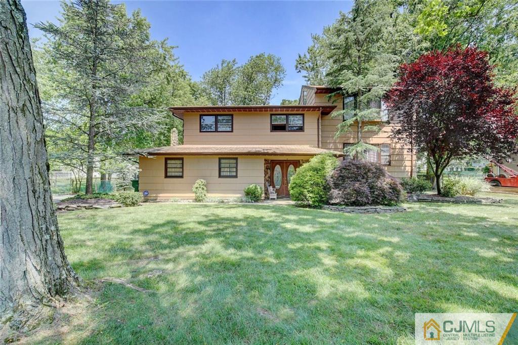 3 Pendleton Place Edison, NJ 08820 - Photo 1 of 47 front view of a house with a yard