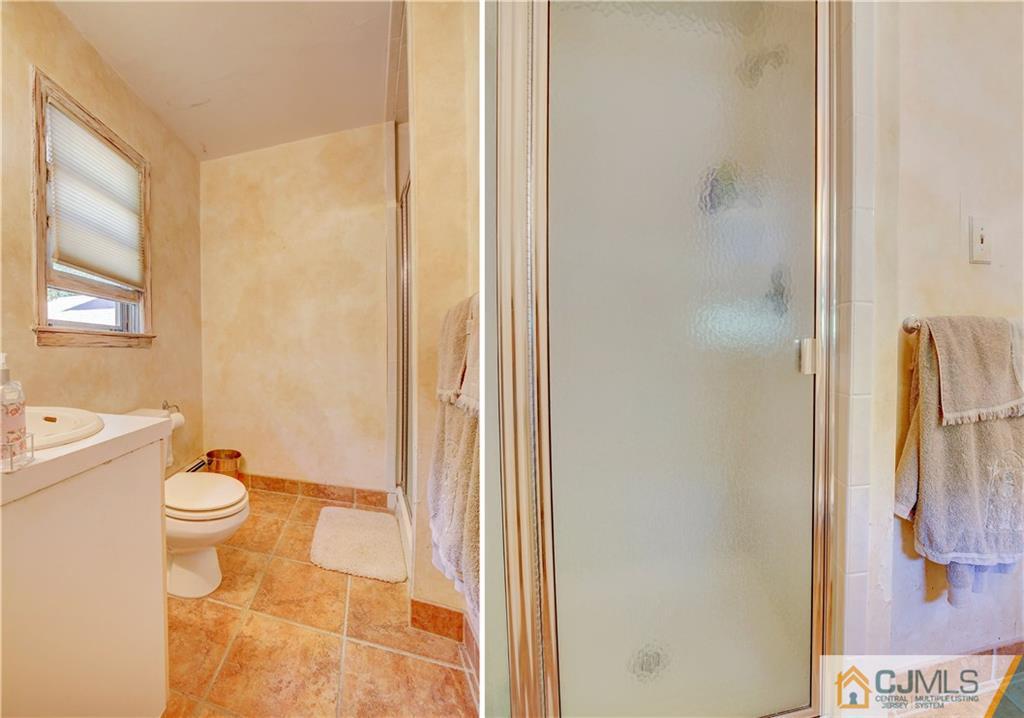 3 Pendleton Place Edison, NJ 08820 - Photo 19 of 47 a bathroom with a granite countertop shower toilet and sink