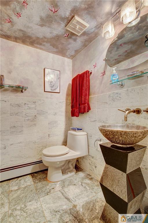 3 Pendleton Place Edison, NJ 08820 - Photo 20 of 47 a bathroom with a toilet and a sink