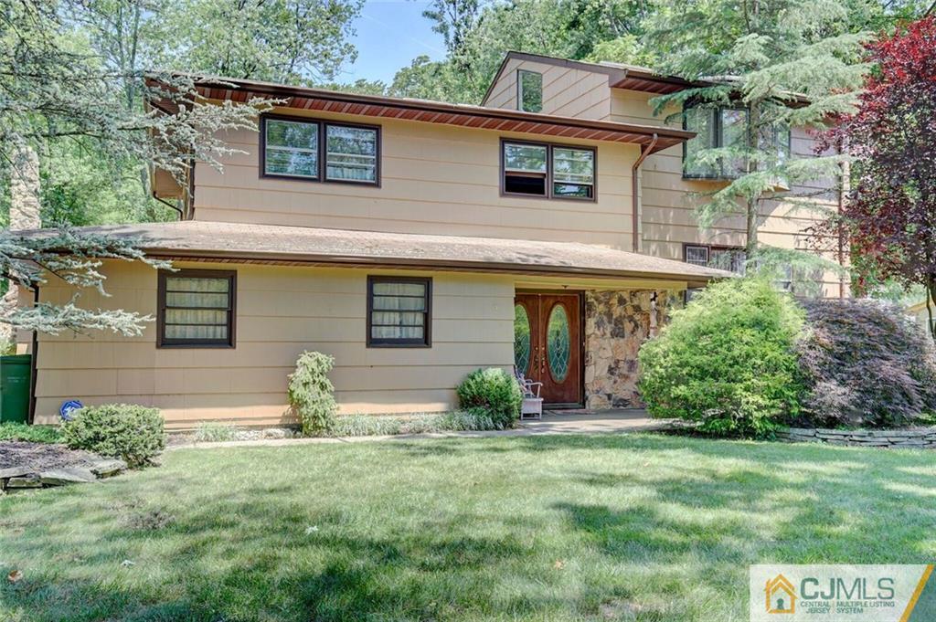 3 Pendleton Place Edison, NJ 08820 - Photo 3 of 47 a front view of a house with garden