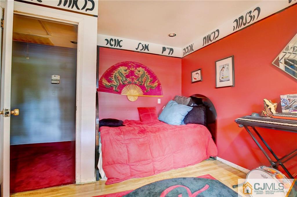3 Pendleton Place Edison, NJ 08820 - Photo 29 of 47 a bedroom with bed and cupboard