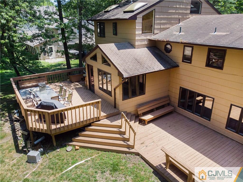 3 Pendleton Place Edison, NJ 08820 - Photo 33 of 47 a view of a house with wooden deck and furniture