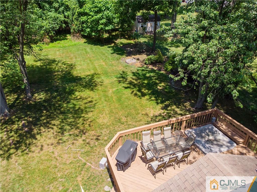 3 Pendleton Place Edison, NJ 08820 - Photo 35 of 47 a view of a swimming pool with a yard