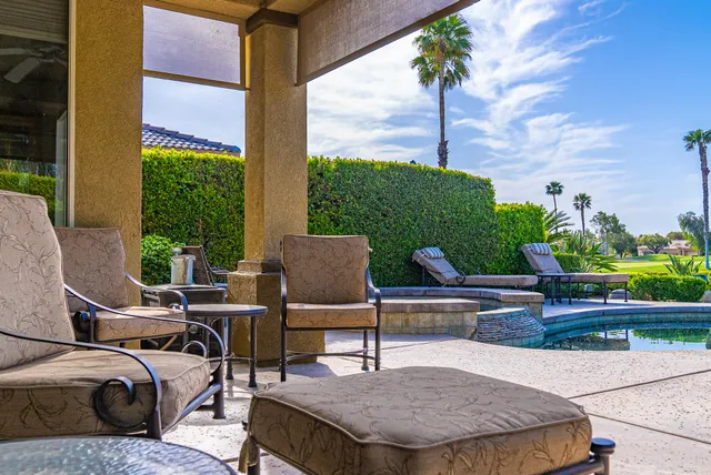 a outdoor living space with furniture and garden view