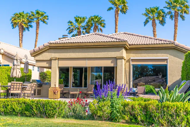 a front view of a house with a porch