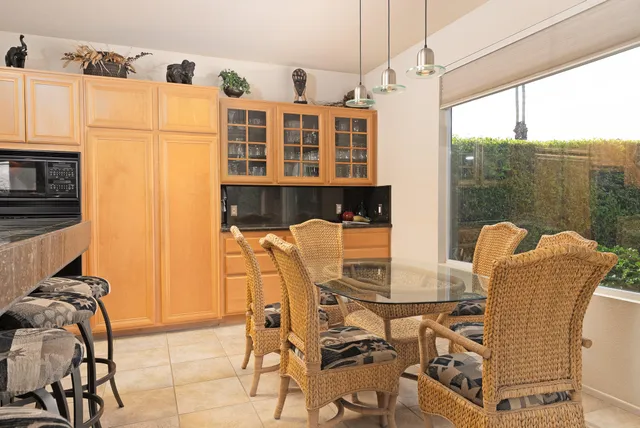 a outdoor dining space with furniture