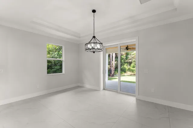 a view of a room with windows