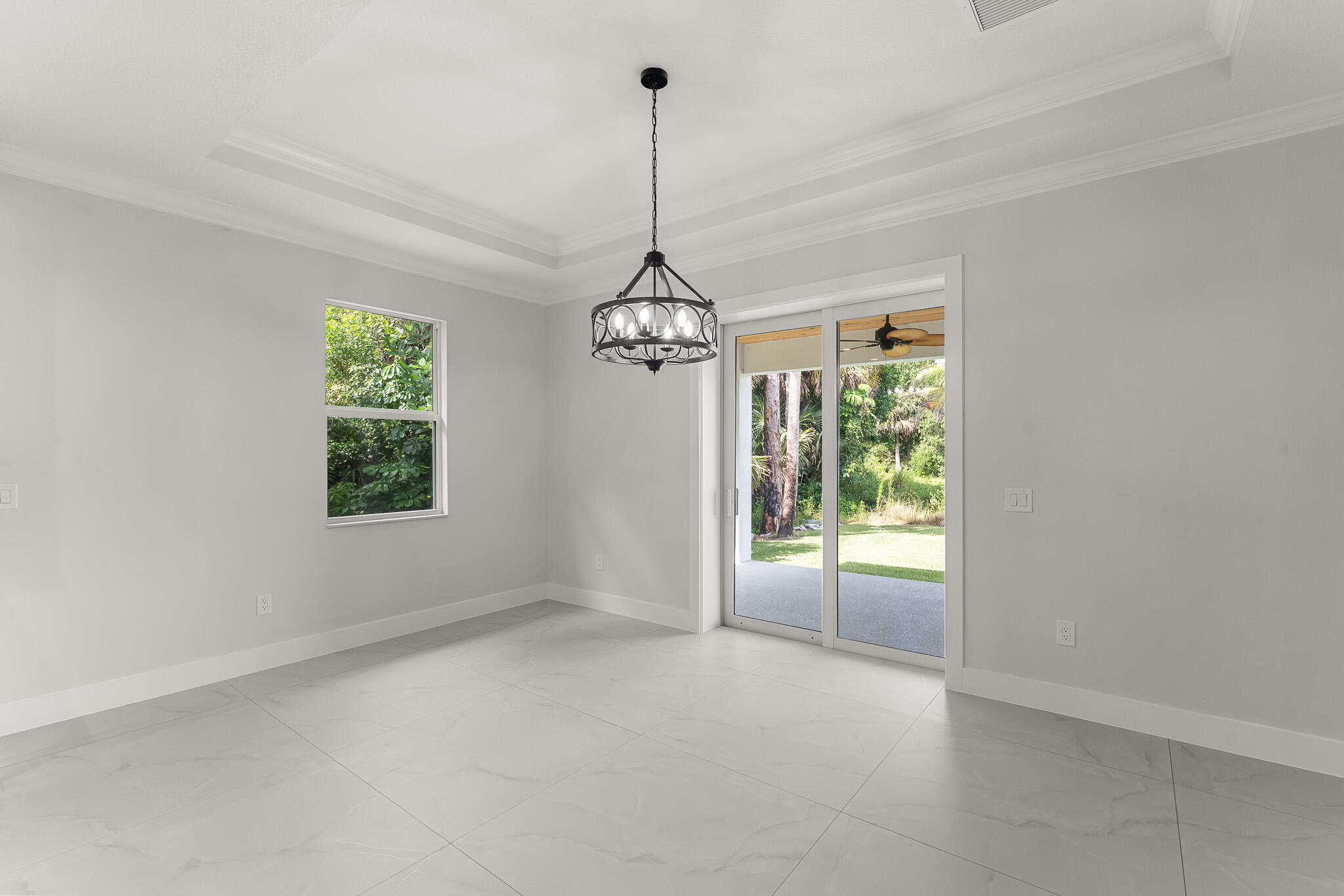 5470 Southeast Front Avenue Stuart, FL 34997 - Photo 11 of 37 a view of a room with windows