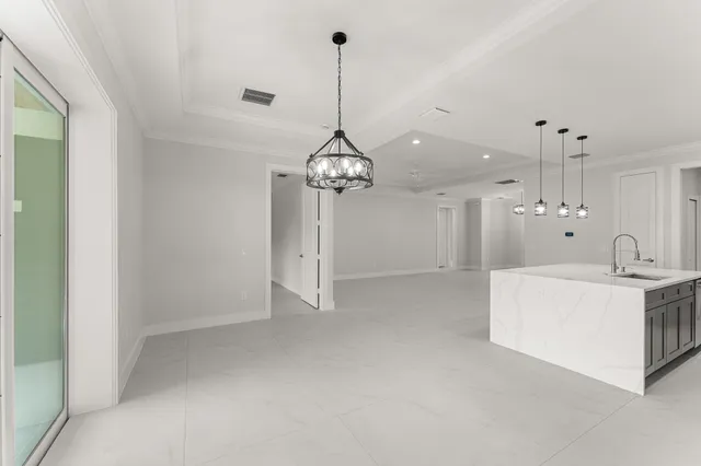 a very nice looking room with a chandelier