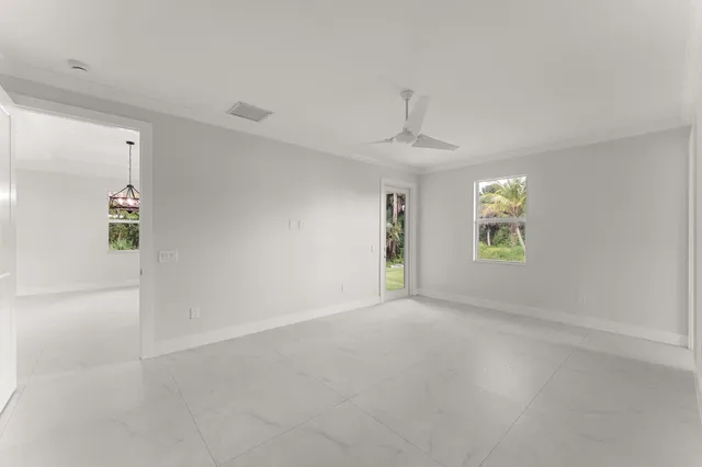 an empty room with windows