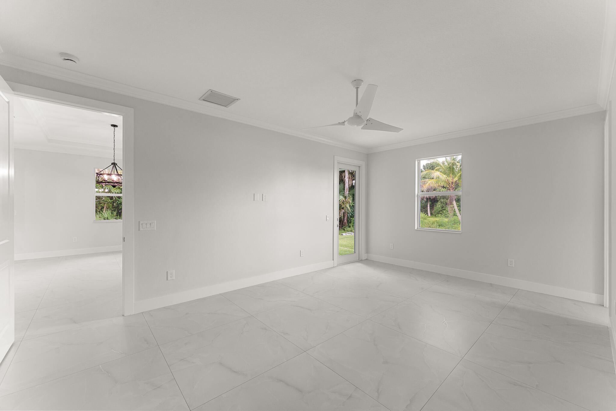 5470 Southeast Front Avenue Stuart, FL 34997 - Photo 20 of 37 an empty room with windows