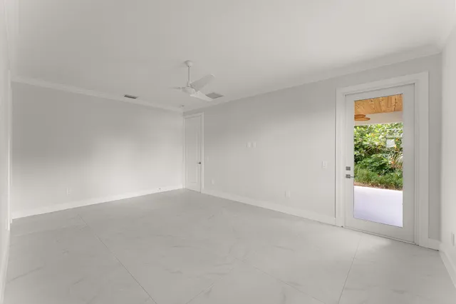 a view of an empty room and window