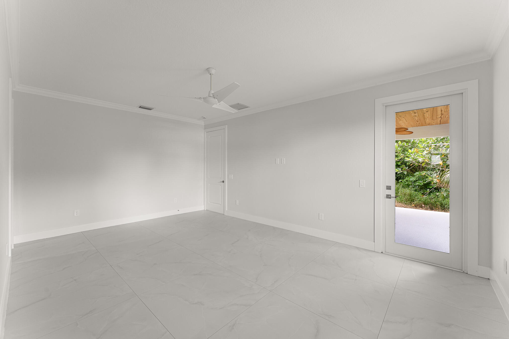 5470 Southeast Front Avenue Stuart, FL 34997 - Photo 21 of 37 a view of an empty room and window