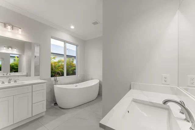 a bathroom with a bathtub sink and toilet