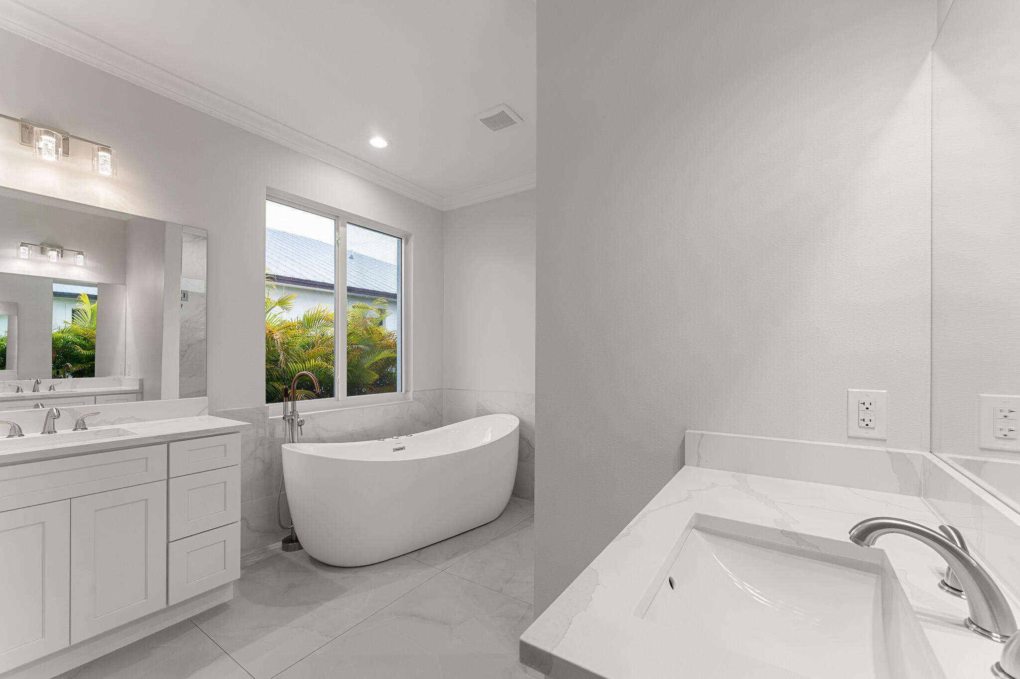 5470 Southeast Front Avenue Stuart, FL 34997 - Photo 22 of 37 a bathroom with a bathtub sink and toilet