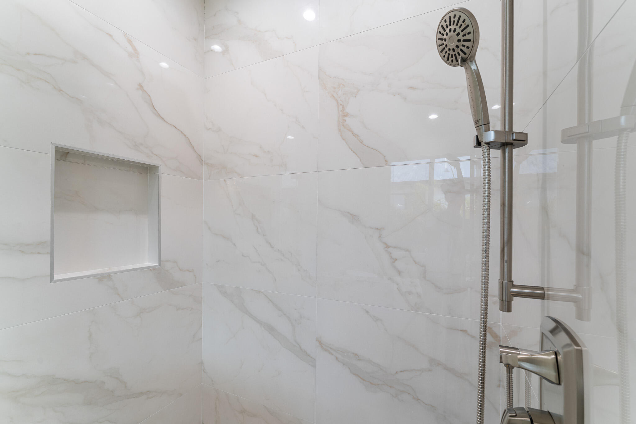 5470 Southeast Front Avenue Stuart, FL 34997 - Photo 25 of 37 a bathroom with a shower