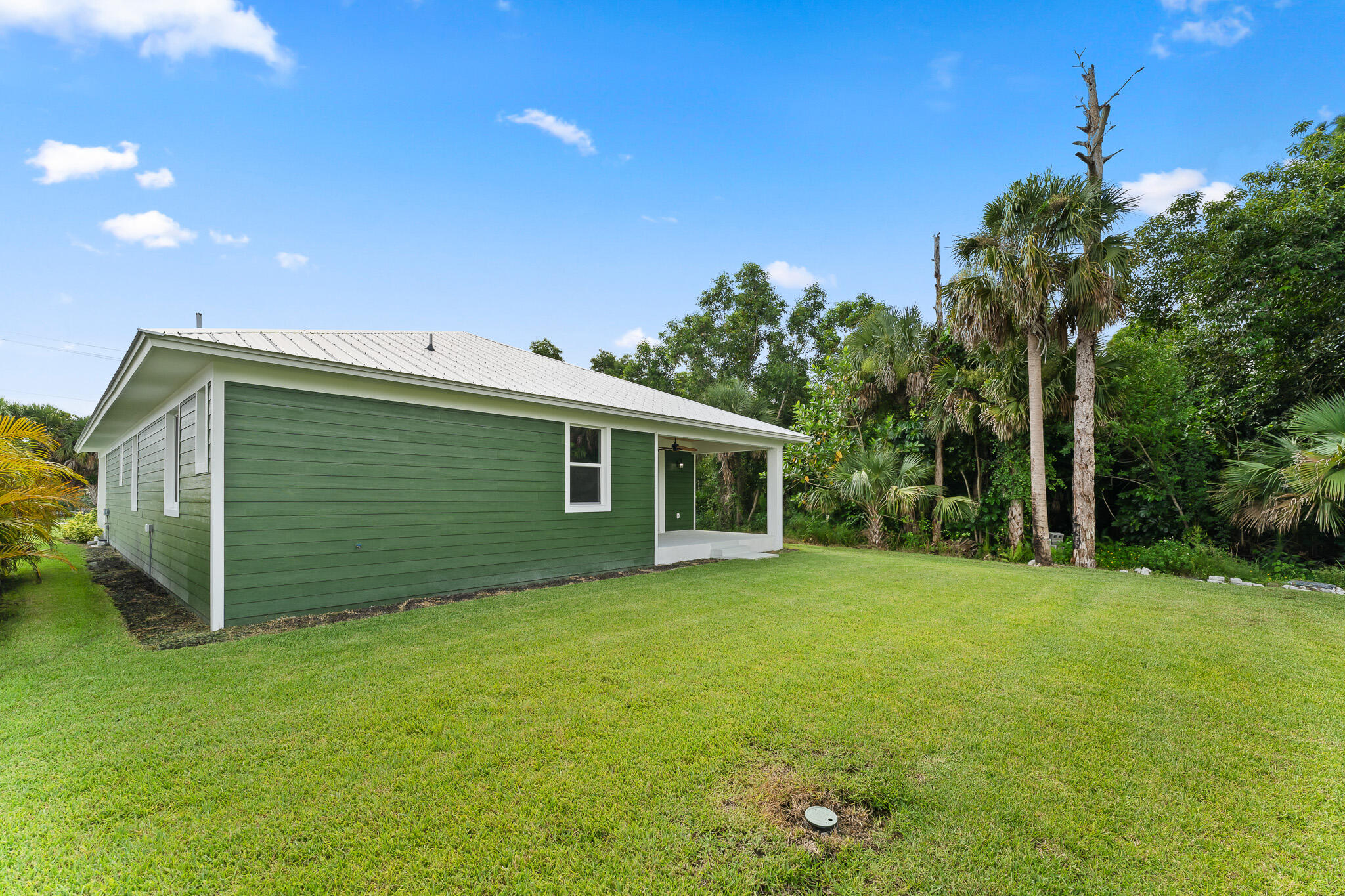 5470 Southeast Front Avenue Stuart, FL 34997 - Photo 34 of 37 a view of a backyard