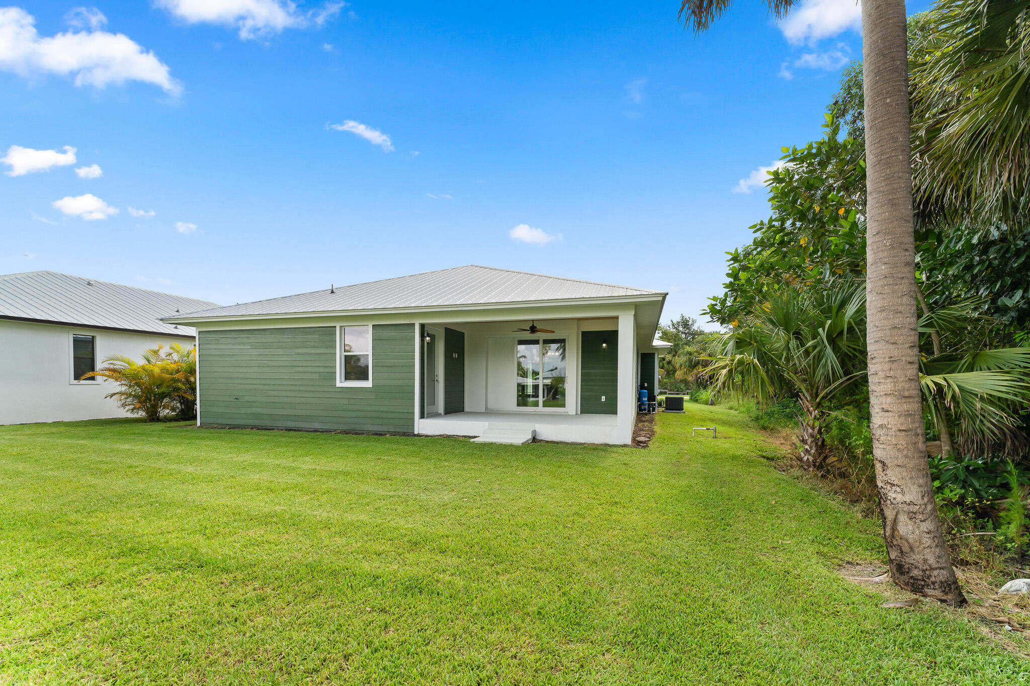 5470 Southeast Front Avenue Stuart, FL 34997 - Photo 37 of 37 a view of a house with a garden