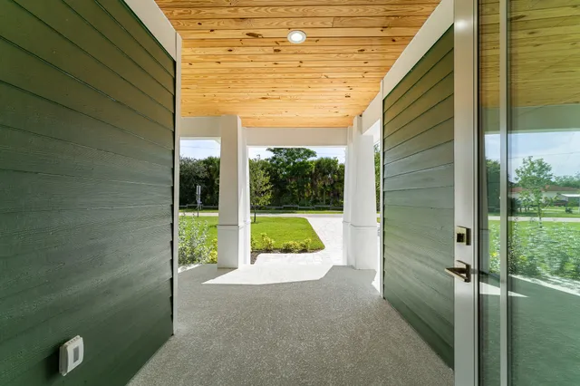 a view of swimming pool with balcony