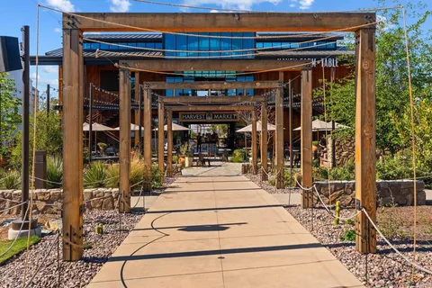 a view of a shop with a table and chairs