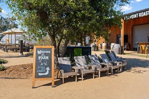 a view of a swimming pool with a lounge chairs