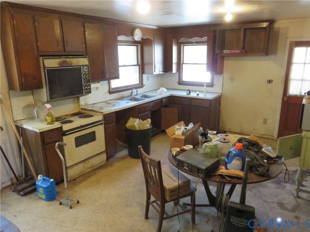 4292 Range Road Mechanicsville, VA 23111 - Photo 12 of 50 a kitchen with a sink appliances and cabinets